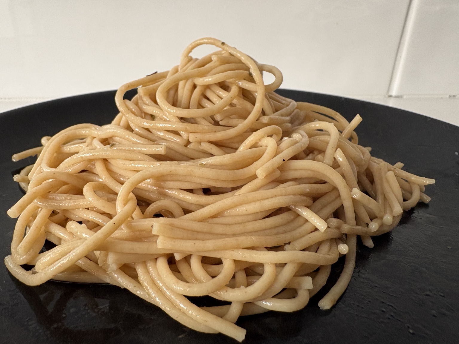 Whole grain pasta lightly dressed with olive oil